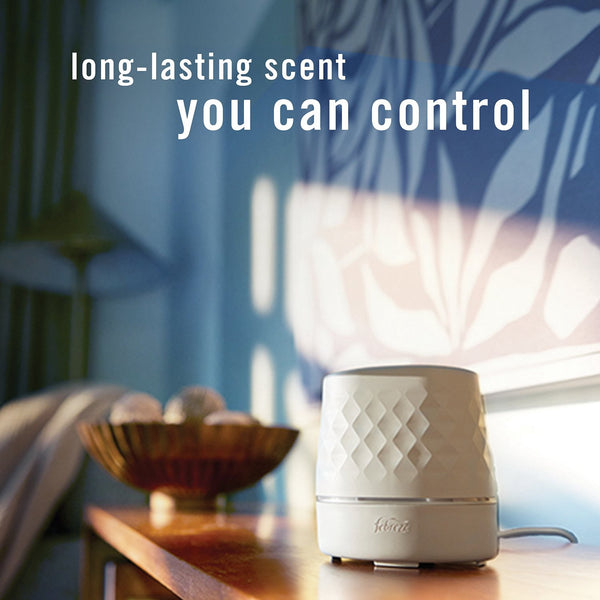 Febreze PLUG Scent Booster Oil Starter Kit, Watermelon & Tropical Blend, 1 Warmer + 3 Refills, 2.63 fl. oz.